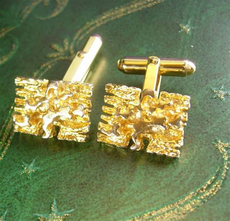 christian dior cufflinks.